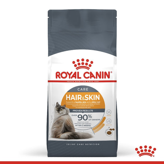Royal Canin cat food package for hair and skin care on a white background