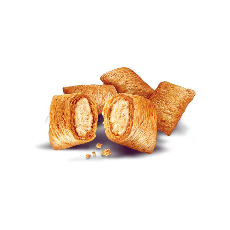 Puff pastry rolls with one cut open on a white background