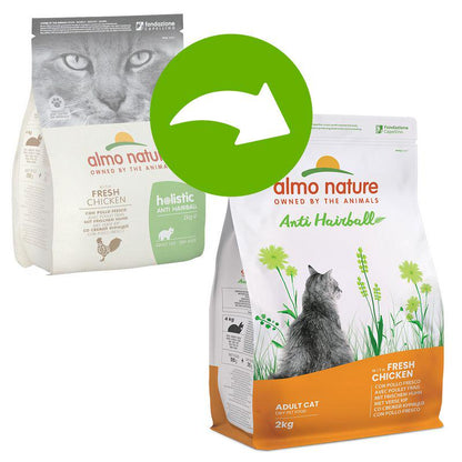 Two packages of Almo Nature Holistic cat food, one with chicken flavor and the other with rice, both designed for adult cats and marked as 'Anti Hairball'.