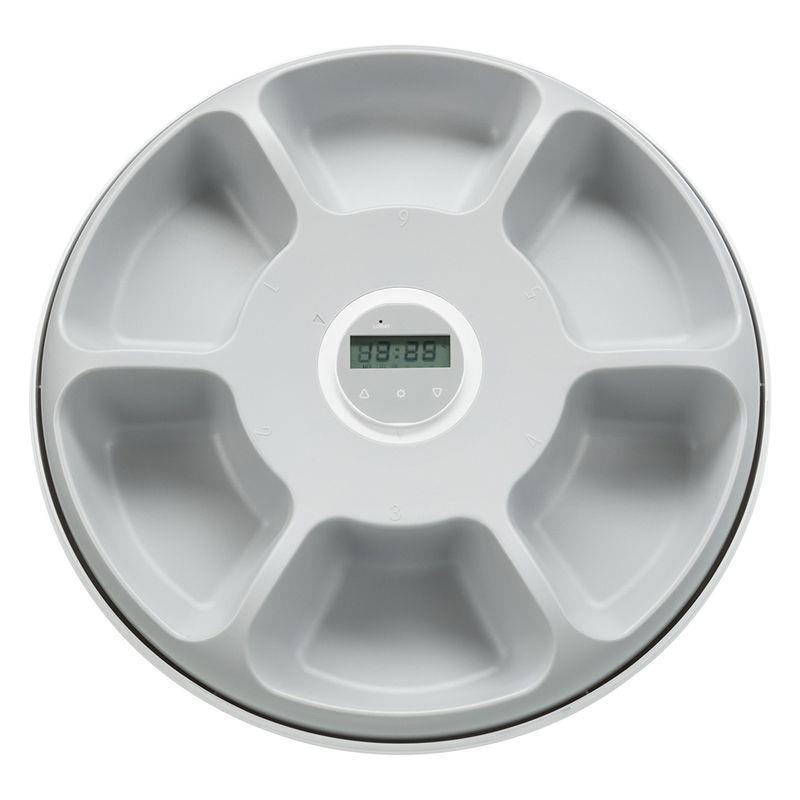 Portion control pet feeder