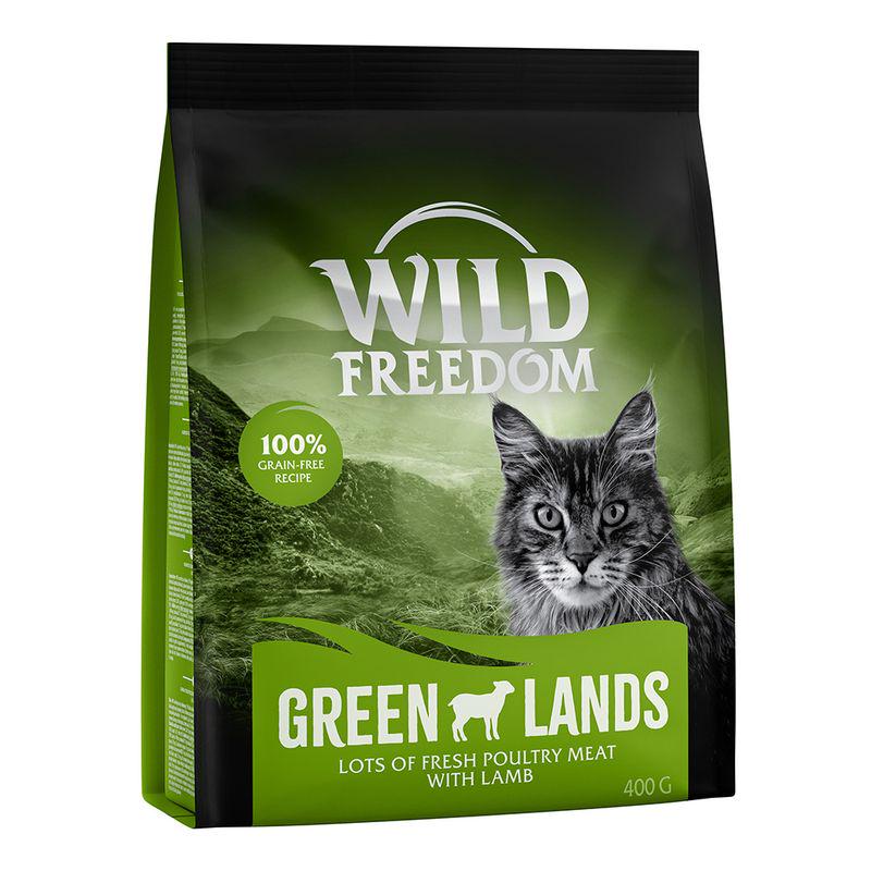 A package of Wild Freedom Adult Green Lands Lamb dry cat food, highlighting a cat image, green color theme, and the grain-free attribute.