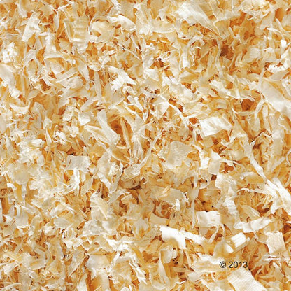 Close-up of wood shavings with a copyright notice in the corner.