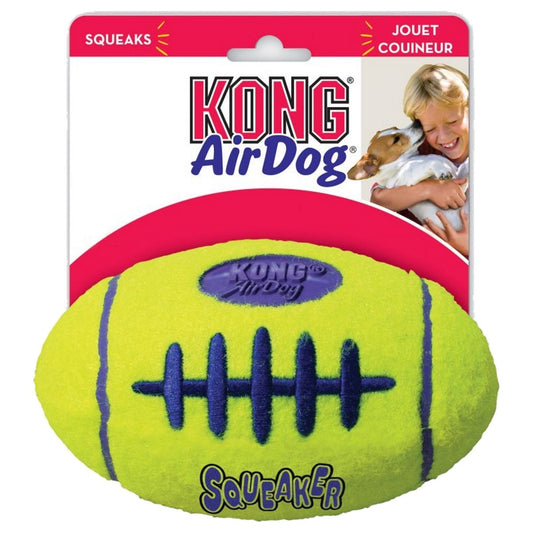 KONG AirDog football-shaped dog toy with packaging featuring a child and dog.