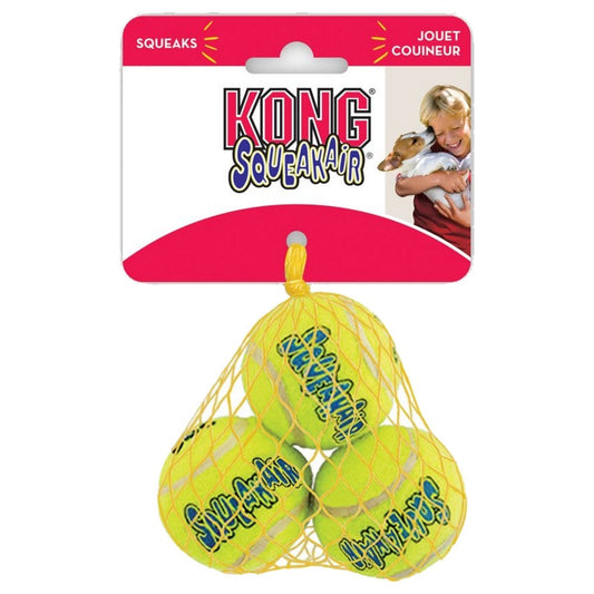 Kong Squeakair dog toy packaging with three yellow balls and a pink label.