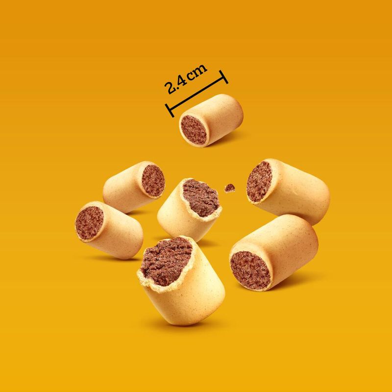 Dog treats with a measurement label on a yellow background